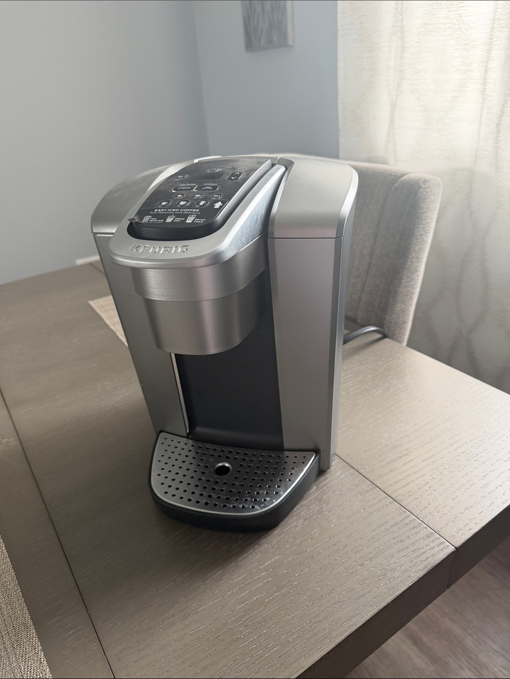 Keurig K-Elite single serve coffee maker in a brushed silver finish.